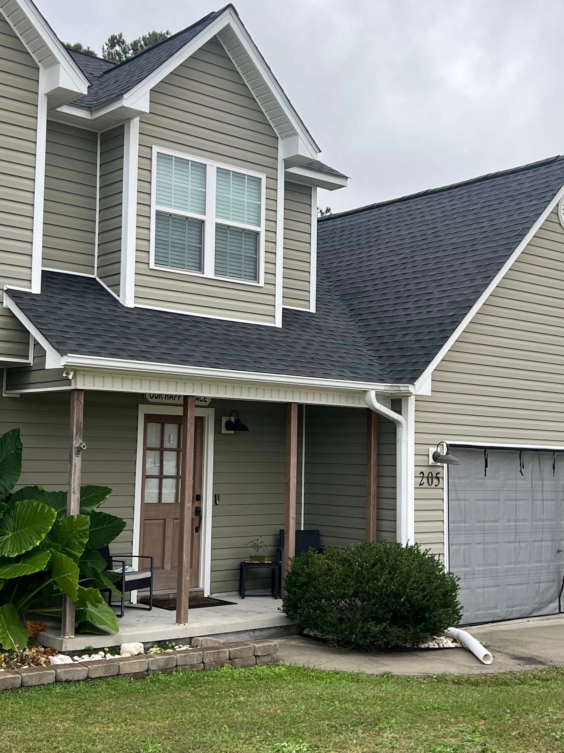 Laying down black shingles